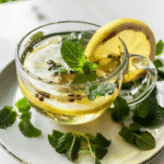 Lemon Balm Tea Recipe That Naturally Soothes Mind & Body 6 lemon balm tea recipe in clear glass mug
