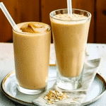 Peanut Butter Smoothie: Easy, Creamy, and Healthy Breakfast Recipe 6 Peanut butter smoothie topped with banana slices